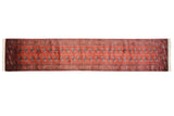 Fine vintage Bokhara rug runner featuring columns of gul medallions on a copper-red ground.