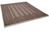 Angled view of a fine Bokhara carpet showcasing the lustrous pile and repeating gul medallions.