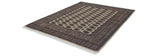 Angled perspective of a fine Bokhara carpet, showing its dense pattern of dark guls on ivory.
