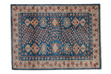 New hand knotted Pakistani Caucasian rug, abrash indigo field, geometric medallions, colorful floral patterns.