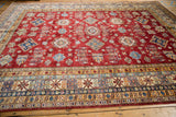 Close-up of the Caucasian design rug's crab style main border and geometric field motifs.