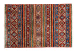 Hand-knotted Pakistani Khorjin rug with vibrant vertical stripes and geometric motifs.