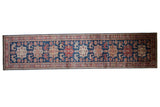 Pakistani Caucasian runner: sapphire blue field, geometric medallions and finned birds, 2'10
