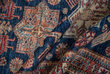 Folded runner showing sapphire blue, cherry red, and ivory Akstafa geometric motifs.