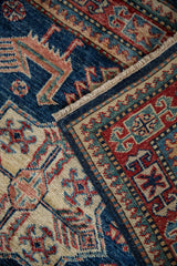 New Pakistani Caucasian runner corner with sapphire blue, ivory geometric patterns, fringe.