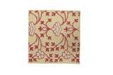 Square Samarkand design rug with raised raspberry floral vines and ivory petals on a pale lemon-lime field.