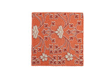Samarkand design square rug with a raised floral pattern in cantaloupe, ivory, and pale red.