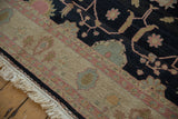 Hand-knotted Soumac carpet fringe, intact side cord, and floral border with dusty rose.