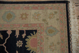 Indian Sultanabad Soumac weave with natural fringe, black selvage, and dusty rose border.