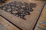 Vintage Indian Soumac design carpet border with beige, faint raspberry florals, and fringe.