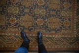 Vintage hand woven Agra Soumac carpet corner, dusty teal, madder floral cartouches, wave border.