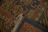 Agra Soumac carpet corner showing tight back, beige fringe, and dusty teal border weave.