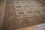 Vintage Indian Soumac carpet border with dusty aubergine, teal floral arabesque, and fringe.