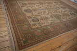 Indian Sultanabad Soumac carpet's secured side selvage and aubergine floral arabesque border.