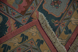 Hand woven Soumac rug corner detail with beige fringe, raspberry rose serrated border.