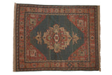 Vintage Indian Serapi Soumac carpet with dusty teal field, madder red medallion, and geometric floral borders.
