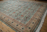 Repeating Perpedil design motifs, rams horn, and starburst florals on the dusty blue field.