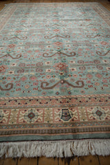 Intricate Perpedil motifs on dusty blue Shirvan rug field with detailed border.