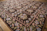 Curvilinear floral vines in dusty mauve, powder blue, olive on vintage Chainstitch carpet.