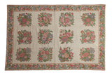 Vintage Chainstitch Carpet featuring an ivory field and twelve pastel floral bouquets, bordered by continuous vines, 6'1