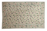 Vintage Chainstitch carpet, ivory field with a curvilinear floral and vine pattern.