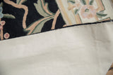 Cotton canvas backing with incremental perimeter stitching on vintage chainstitch carpet.