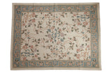 Vintage Chainstitch rug with curvilinear ivory, blush, and slate blue floral pattern, 7'2