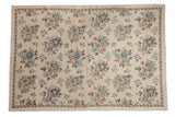 Vintage chainstitch carpet: ivory field, allover floral pattern in muted pastels, 5'11