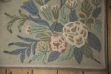 Chainstitch rug corner, colonial floral design, spiraling texture, denim blue, dusty rose.