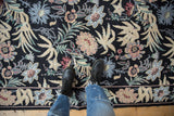 Vintage chainstitch rug, William Morris inspired curvilinear pattern in black, blush, and seafoam.