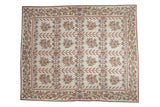 Vintage Chainstitch carpet, ivory field with pale red and blue floral trellis pattern.
