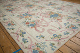 Colonial floral chainstitch carpet border with dusty pink ribbons and blue, rose sprays.