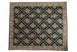 Vintage Chainstitch carpet, navy field, blush, green, blue floral trellis. 7'10