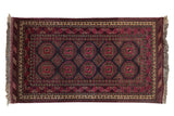Vintage Daulatabad rug, fuchsia ram's horn guls on charcoal, detailed floral borders, 3'6