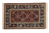 Vintage Armenian Joshegan rug with a burgundy field, a deep teal border with palmettes, and turtle motifs.