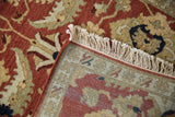 The hand-knotted construction and fine wool pile of a vintage Armenian Sultanabad rug.