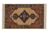 Vintage Armenian Serab rug with a geometric diamond medallion on a sand field, framed by navy and rust borders.
