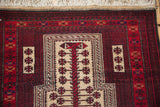 Ivory and cherry red tree of life design with snowflake motifs on a Belouch rug.