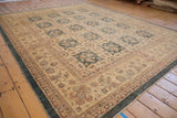 Peshawar carpet's dusty teal side cord selvage and wheat floral vine border.