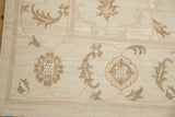 Ivory and beige hand woven Indian Soumac carpet with Rococo floral arabesques and scrolling tendrils.