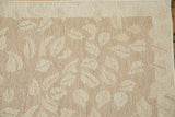 Contemporary Indian Soumac carpet, hand-woven beige and ivory leaf pattern with subtle abrashed texture.