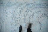 Abstract Indian carpet showcasing diverse powder blue and ivory asymmetric square motifs.