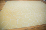 Textured hand-woven Soumac with pale saffron yellow and ivory fluid interconnected outlines.