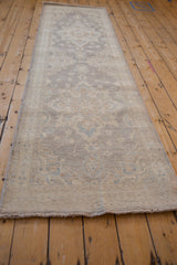 Hand knotted Peshawar runner with subtle floral medallions in ivory, silver, and dusty blue.
