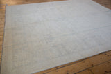 Side cord selvage and even, ice white pile texture of the Peshawar carpet.
