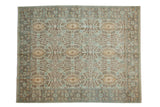 Hand-knotted Peshawar Carpet featuring cameo medallions in seafoam green, saffron, and copper.
