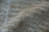Soft, lustrous pile texture of a Pakistani Contemporary rug with abrashed silver and blue design.