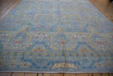 Pakistani Contemporary rug with Persian style geometric patterns in silver, blue, yellow, and red.