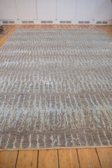 Lustrous Pakistani Contemporary carpet, elongated silver and powder blue design on abrashed field.