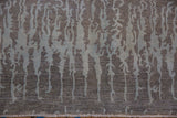 Soft simulated silk pile, contemporary oxidized silver and powder blue vertical design with fringe.